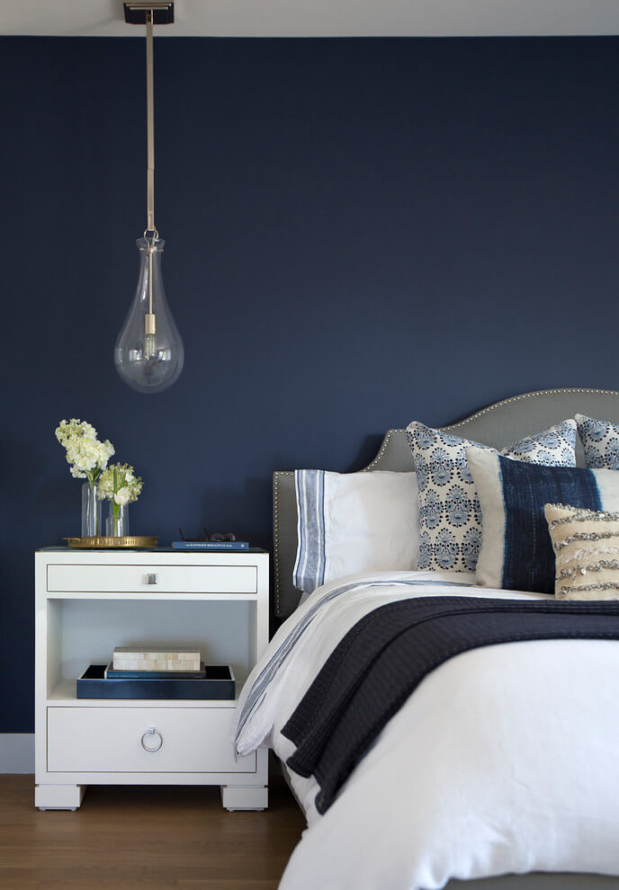 Blue Accents In White Bedroom