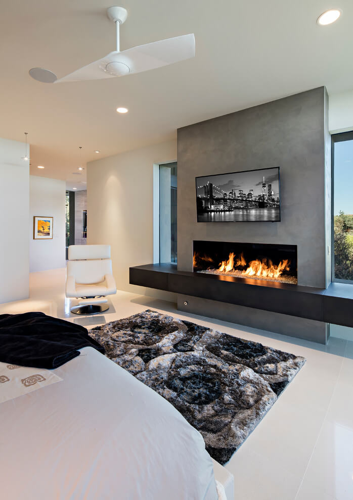 Contemporary Bedroom With Fireplace